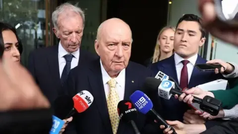 Sexual Assault Accusations Against Prominent Down Under Media Personality Downgraded